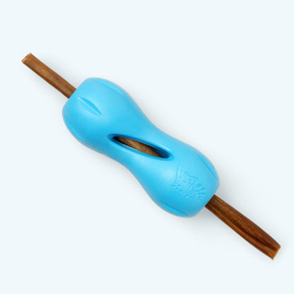 Aqua blue Qwizl holding a long treat stick