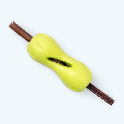 Granny smith Qwizl holding a long treat stick