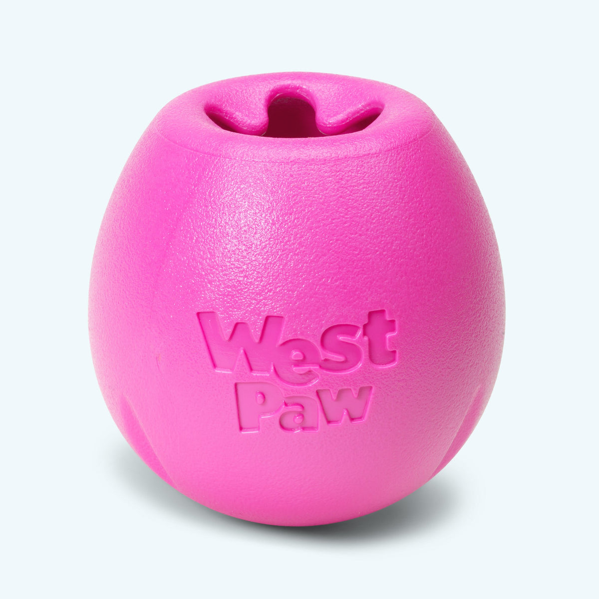 Hot pink West Paw Rumbl treat-dispensing puzzle toy