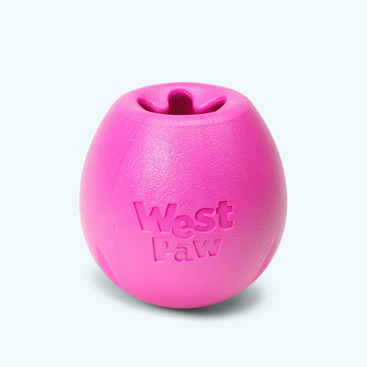 Hot pink West Paw Rumbl puzzle toy