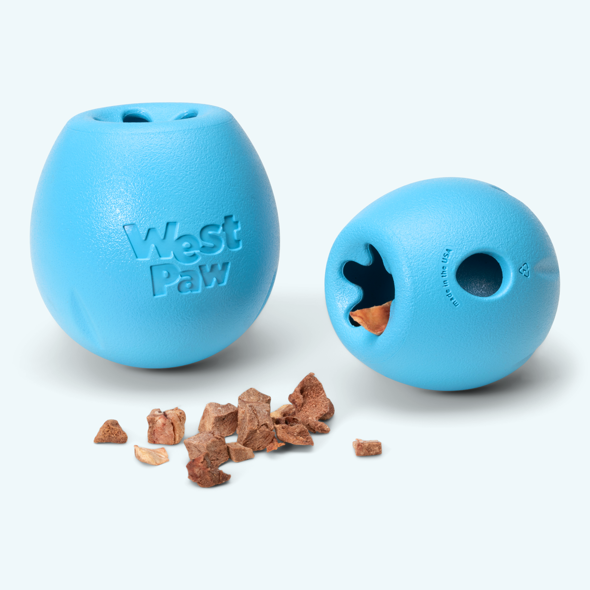 Front and side views of an aqua Rumbl with treats