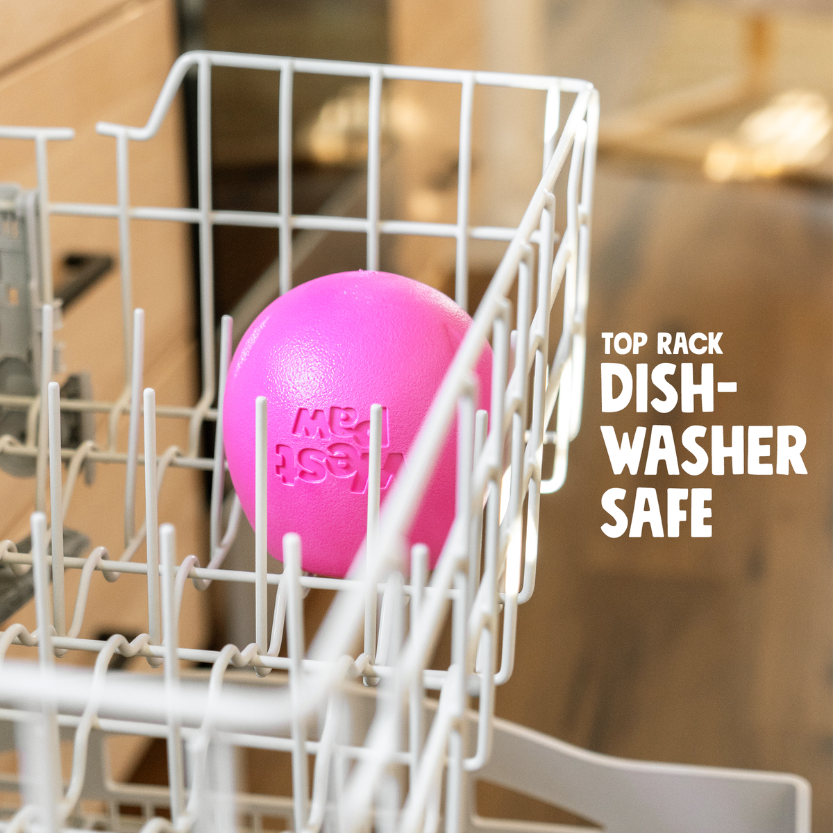 Hot pink Rumbl in the top rack of a dishwasher