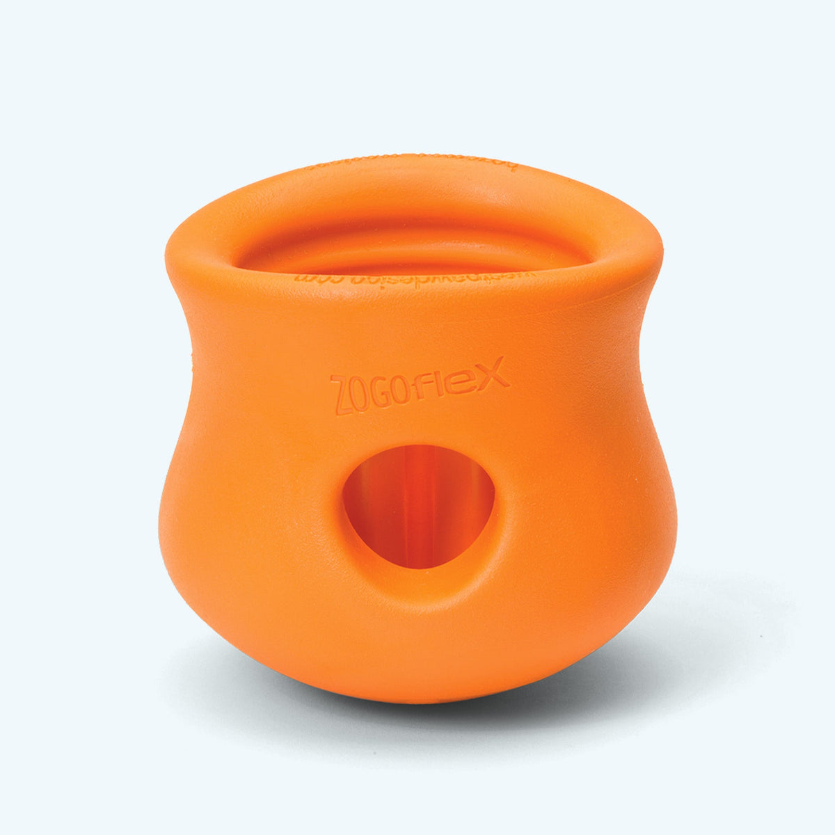 Back view of a tangerine Toppl showing the side opening