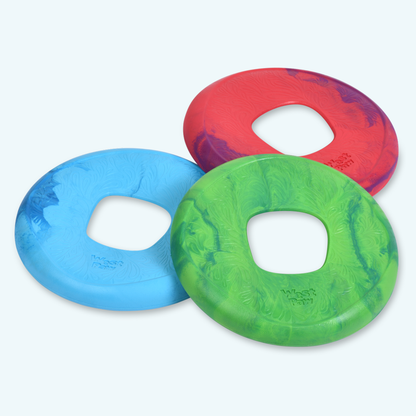 West Paw Sailz fetch discs in blue, red and green on a white background